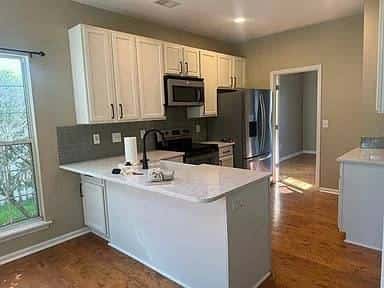 This beautiful home located in Belle Hall neighborhood has 3 bedrooms 5