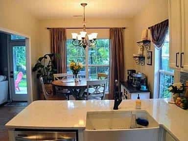 This beautiful home located in Belle Hall neighborhood has 3 bedrooms 4